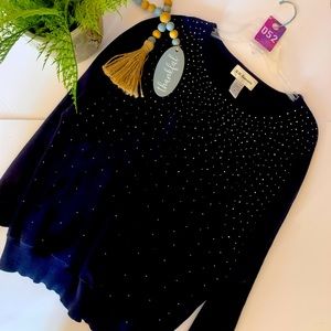 Gorgeous sweater in sz. XL. Dark in color black or really dark blue.